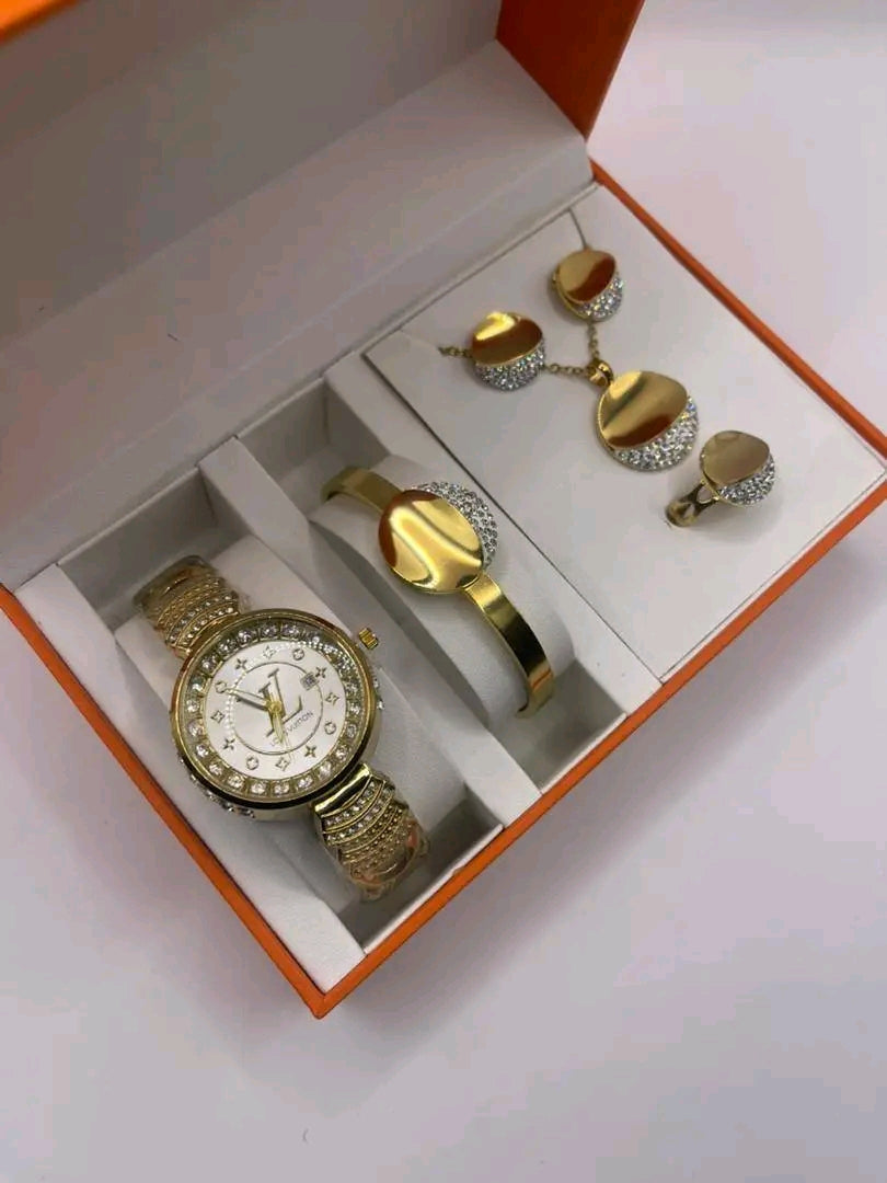 Ensemble de montre et bijoux en or plaqué